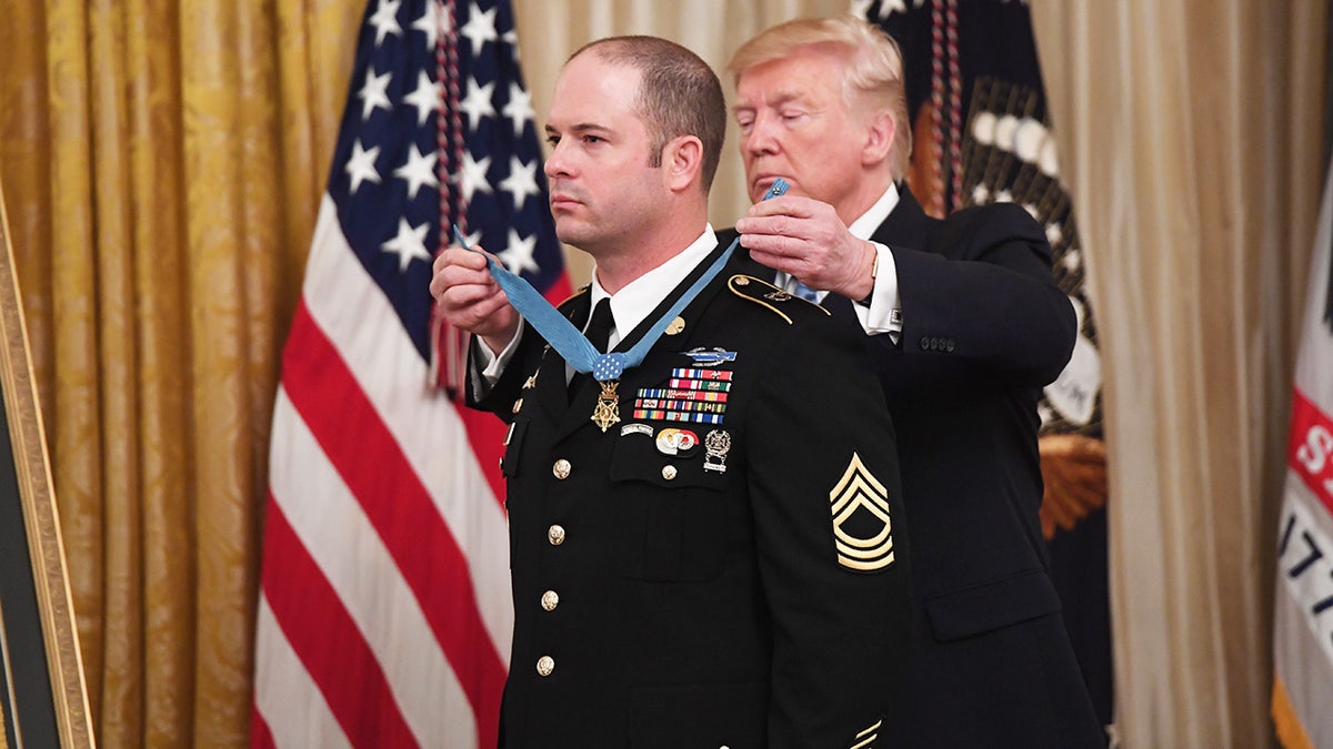 Trump places Medal of Honor on US.. Army Master Sgt. Matthew Williams